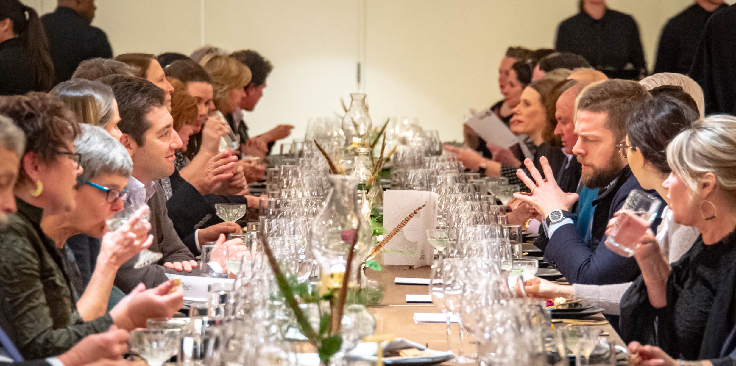 Corporate dinner on a long table